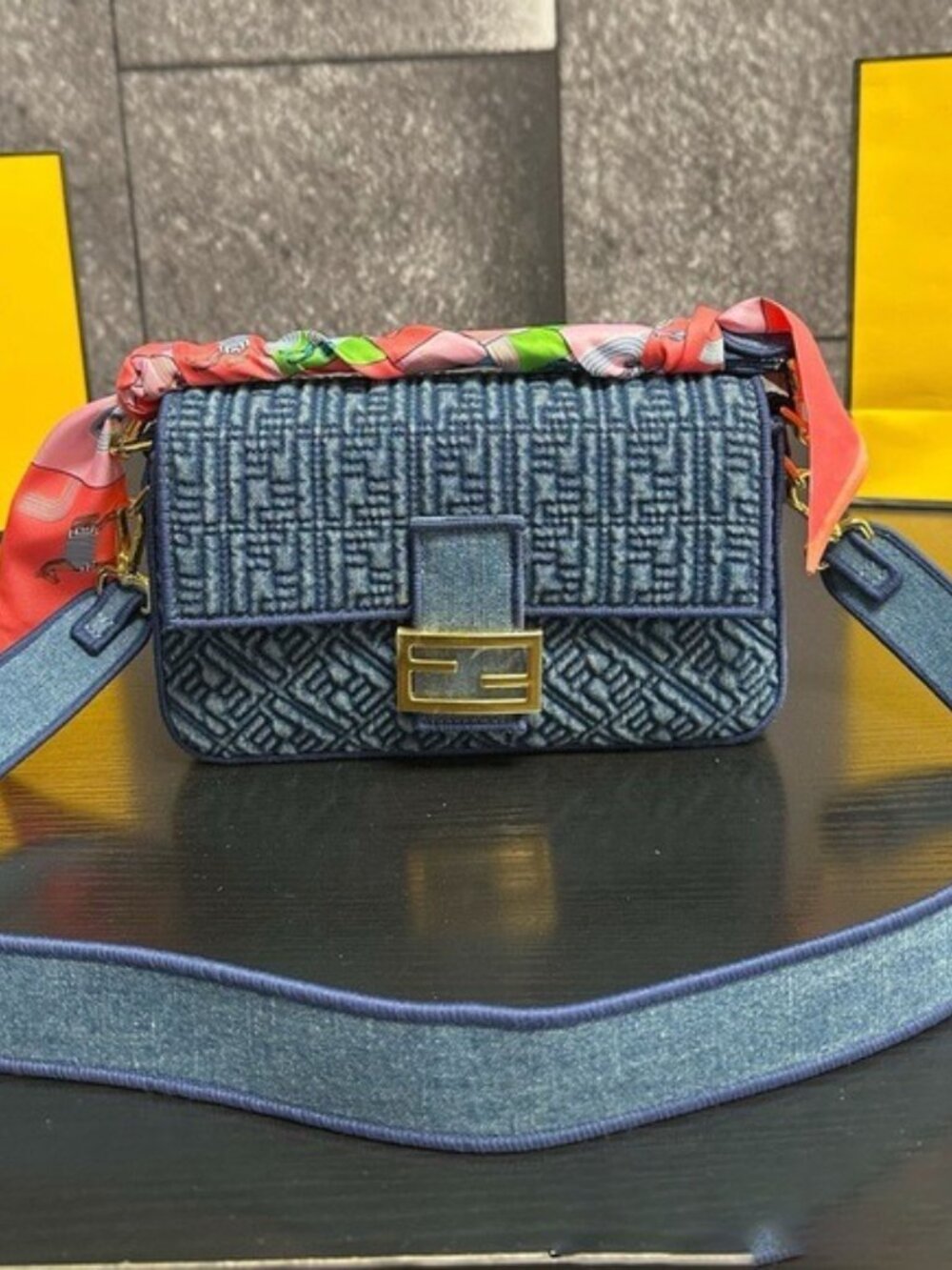 The Fendi Baguette collection typically features the iconic FF logo.